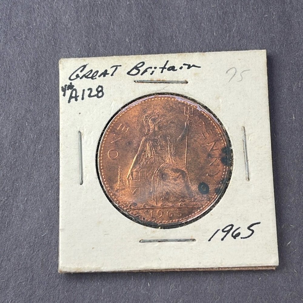 1965 Great Britain One Penny 
It does have wear some coloration see photos